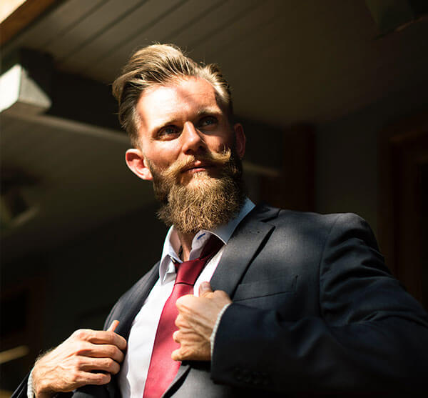 Businessman posing with mustache