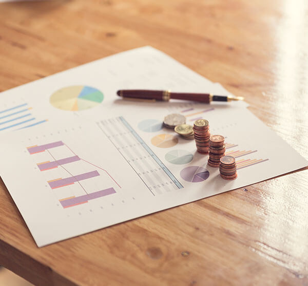 Business report with graphs and props to accompany picture